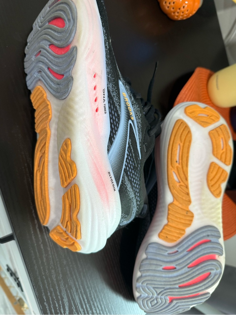 Brooks  Black and White Athletic Sneakers with Orange Accents
